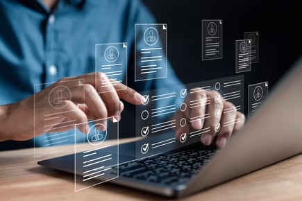 compliance analyst using tech EDD shutterstock_2346433499-1